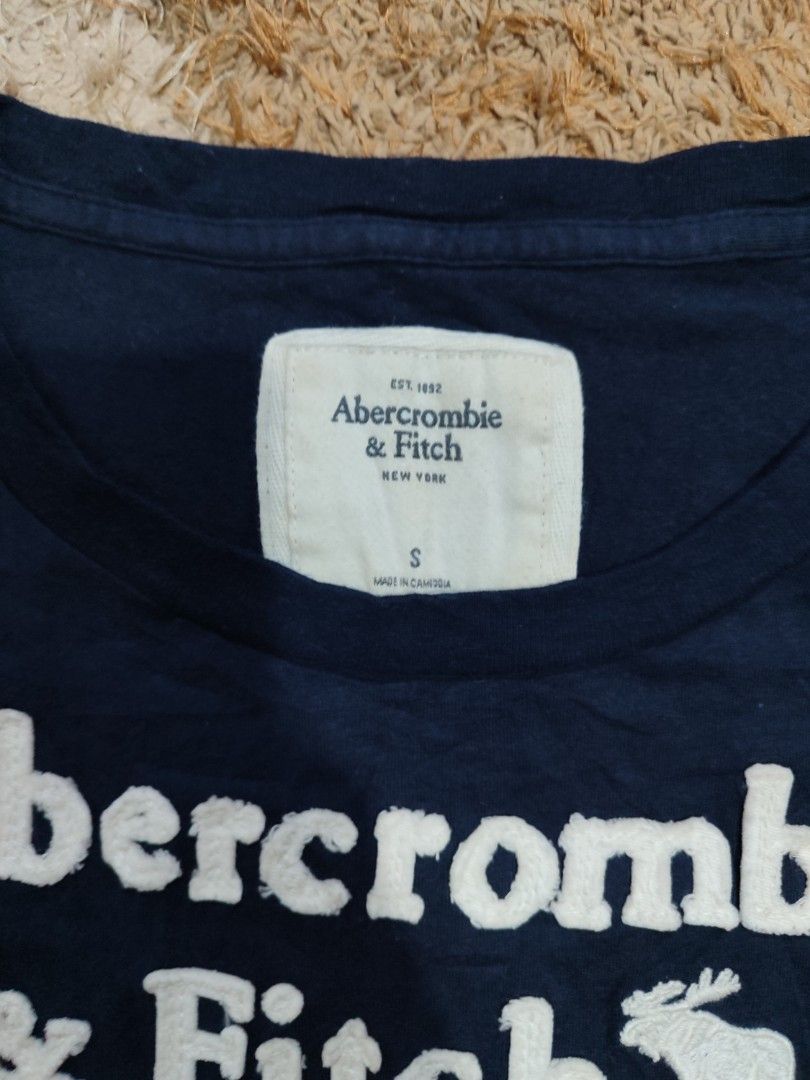 ABERCROMBIE SPELL OUT SHIRT (Category: Shirts) located in Pagadian. Submitted by miraculouspat (Listing ID 1469302115, Image 2). Description: L 23 W 14 10/10 COLOR ASNEW CONDITION AUTHENTIC NO ISSUE COLOR MAY VARY DUE TO LIGHT.