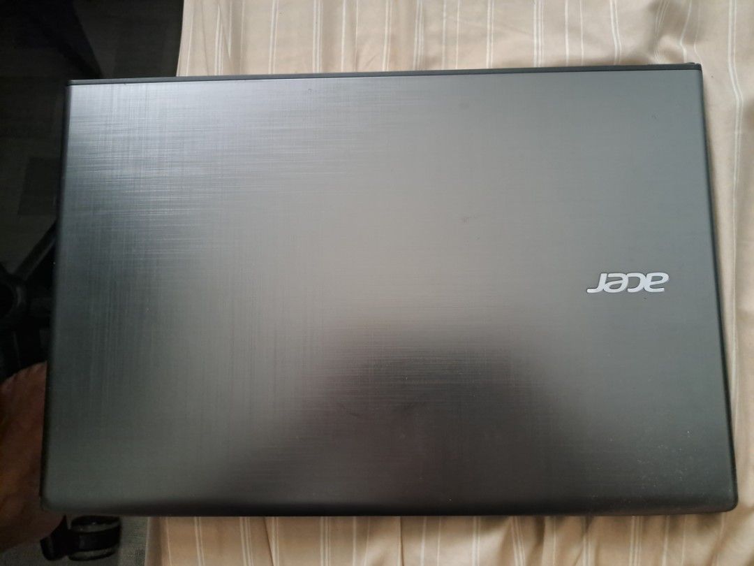 Acer Aspire E5-576G | Defective (Category: Laptops & Notebooks) located in Talisay. Submitted by taxicabreros (Listing ID 1469210598, Image 1). Description: Send offers, selling for scrap parts Defects identified: Damaged battery (only works when constantly plugged in) LCD has visual issues when hinge is folded at certain angles Missing down arrow key RAM issues (shuts off shortly after turning on) HDD makes noise when reading programs Specs: Int