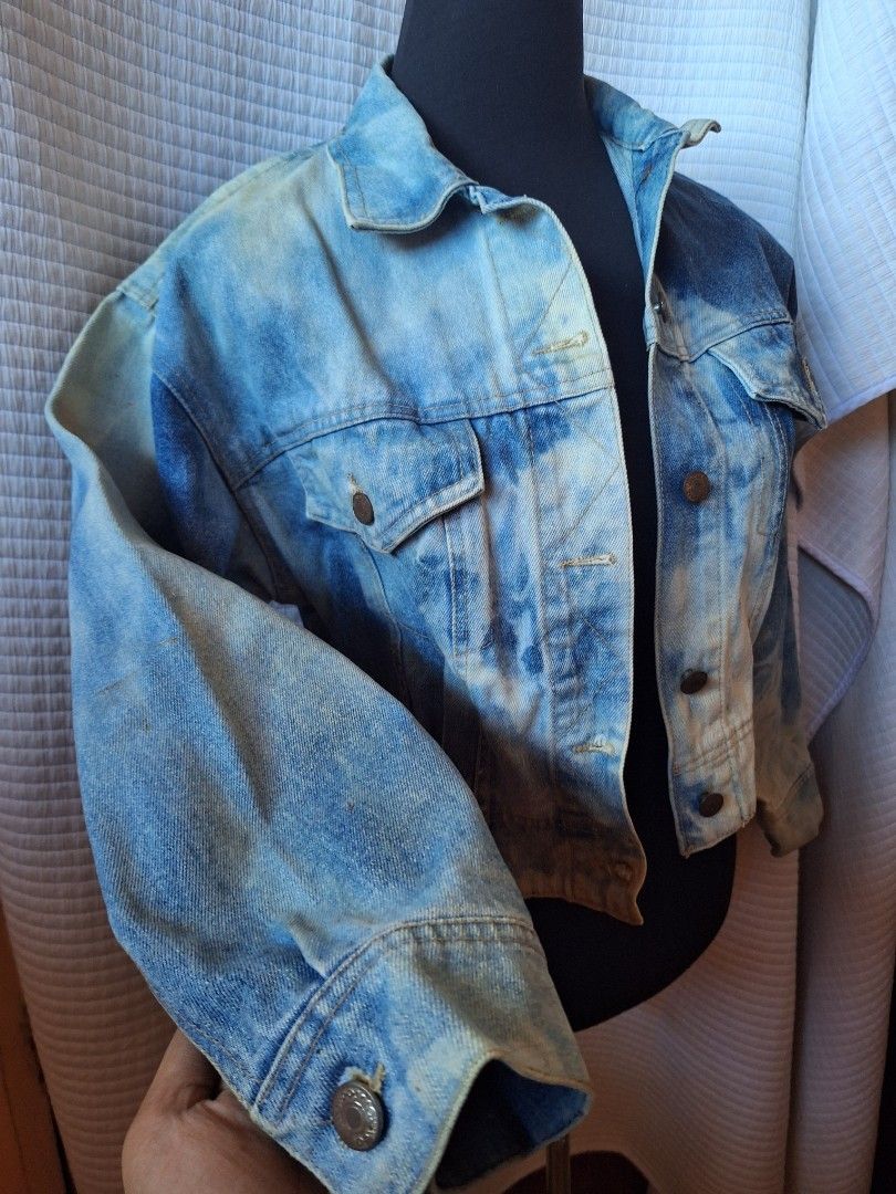 Acid wash denim jacket with button closures and chest pockets (Category: Coats, Jackets and Outerwear) located in Balamban. Submitted by ubethan (Listing ID 1469232297, Image 3). Description: - Acid wash denim jacket in blue and white - Trendy cropped fit style - Front button closure with metallic hardware - Dual chest pockets with flaps - Long sleeves with buttoned cuffs - Great layering piece for everyday casual outfits.