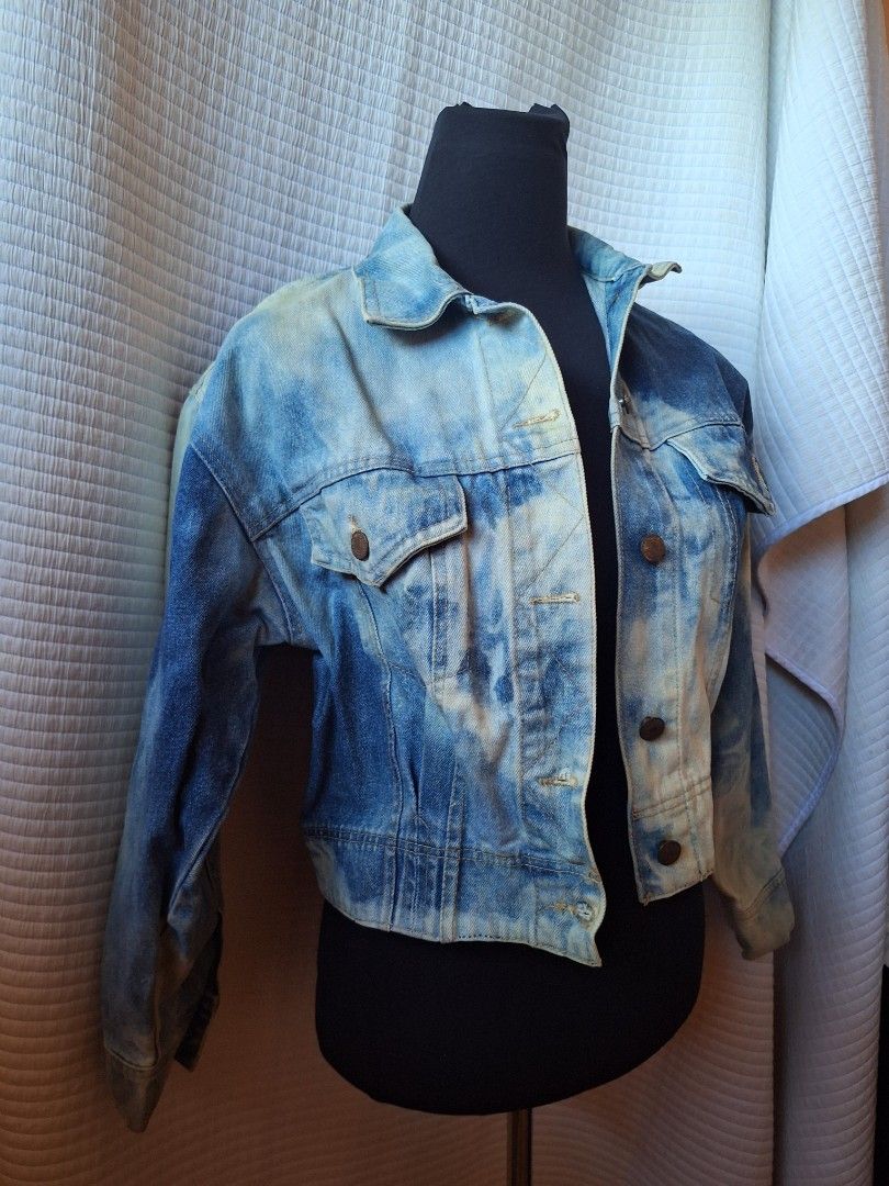 Acid wash denim jacket with button closures and chest pockets (Category: Coats, Jackets and Outerwear) located in Balamban. Submitted by ubethan (Listing ID 1469232297, Image 2). Description: - Acid wash denim jacket in blue and white - Trendy cropped fit style - Front button closure with metallic hardware - Dual chest pockets with flaps - Long sleeves with buttoned cuffs - Great layering piece for everyday casual outfits.