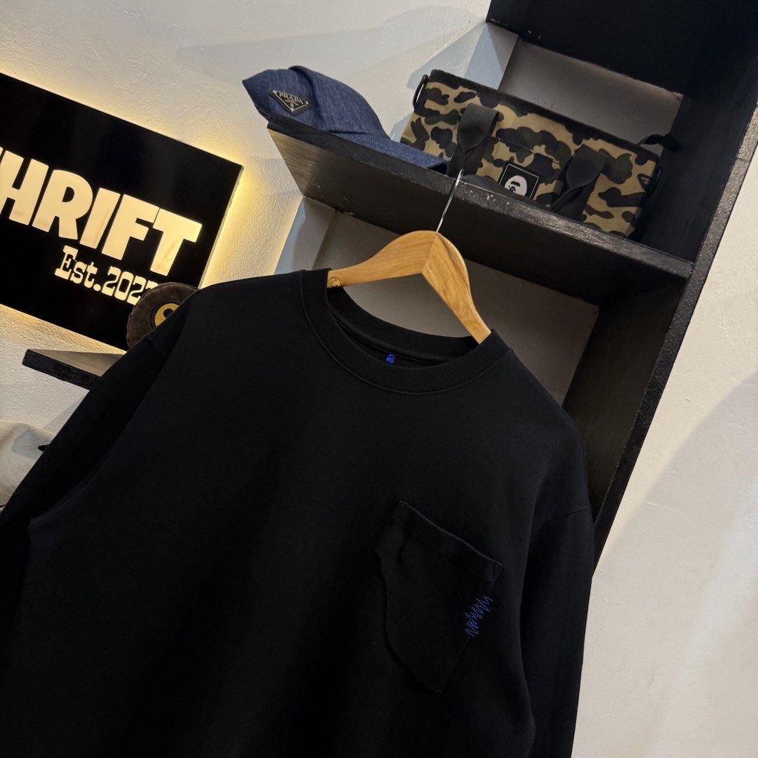 Ader Error Black Pocket Sweatshirt (Category: Coats, Jackets and Outerwear) located in Manila. Submitted by carbungcoalex (Listing ID 1469335784, Image 2). Description: ADER ERROR X BEARBRICK BLACK SWEATSHIRT 22.5 by 27 Excellent Condition Complete tags 1300 CLAIM.