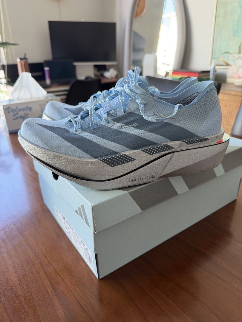 Adidas Adios Pro 5 US 8.5M / 9.5W (Category: Sneakers) located in Makati City. Submitted by fmartinz (Listing ID 1469176894, Image 2). Description: - Model: Adidas Adizero Adios Pro 5 - Color: Light Blue / Silver - Size: Men’s US 8.5 / Women's US 9.5 / UK 8 / JP 26.5 - Condition: Brand new, never used, original box and price tag included - RfS: was gonna use for race, went with Puma DNE4 instead.