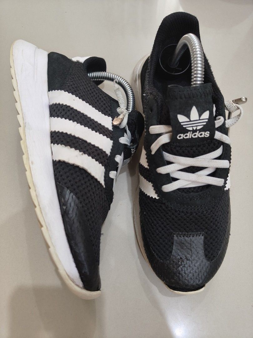 Adidas Black and White Sneakers (Category: Sneakers) located in Calamba. Submitted by an_ne0501 (Listing ID 1469209081, Image 1). Description: - Authentic black and white Adidas sneakers - Iconic three stripes design with classic trefoil logo patch on the tongue - Breathable mesh upper construction with durable leather toe cap overlays - Comfortable white rubber midsole with reliable tread pattern on the outsoles - FREE shoe trees included to hel