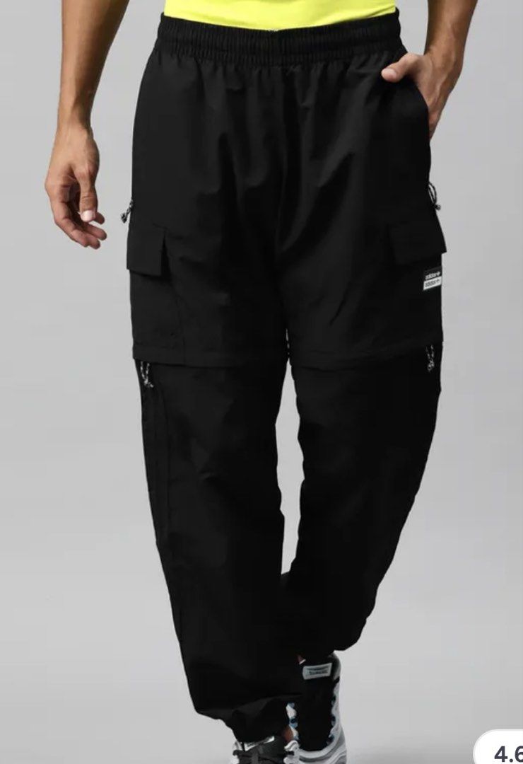 Adidas Black Convertible Cargo Pants (Category: Joggers) located in Cagayan de Oro. Submitted by aljay02 (Listing ID 1469296228, Image 1). Description: - Brand: Adidas - Color: Black - Style: Convertible cargo pants (zips off into shorts) - Waist: ~14.5 inches across (with elastic band and drawstring) - Features: Utility side pockets, branded patch, lightweight fabric, cuffed ankles - Condition: Excellent.