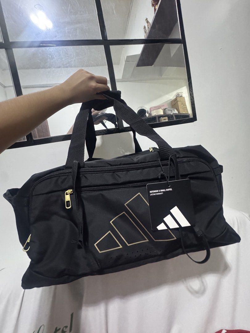 Adidas Defender 5 Small Duffel Bag (Category: Sling Bags) located in Manila. Submitted by shaineee (Listing ID 1469299325, Image 1). Description: - brand new - sleek color way - price slightly nego.