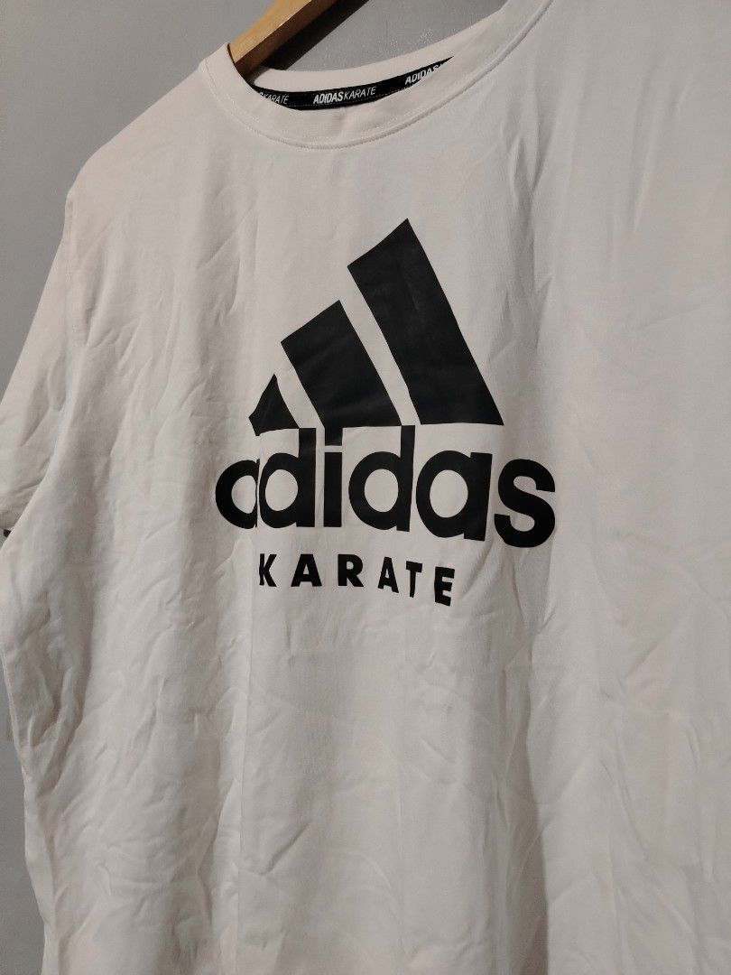 Adidas Karate (Category: Tshirts & Polo Shirts ) located in Bocaue. Submitted by adrianberi35876 (Listing ID 1469252936, Image 2). Description: Adidas Width:21.2 Length:27.5 Streachable Condition:9/10 Color Rate:9/10 Issue:minimsl stain (need rewash) ₱350.