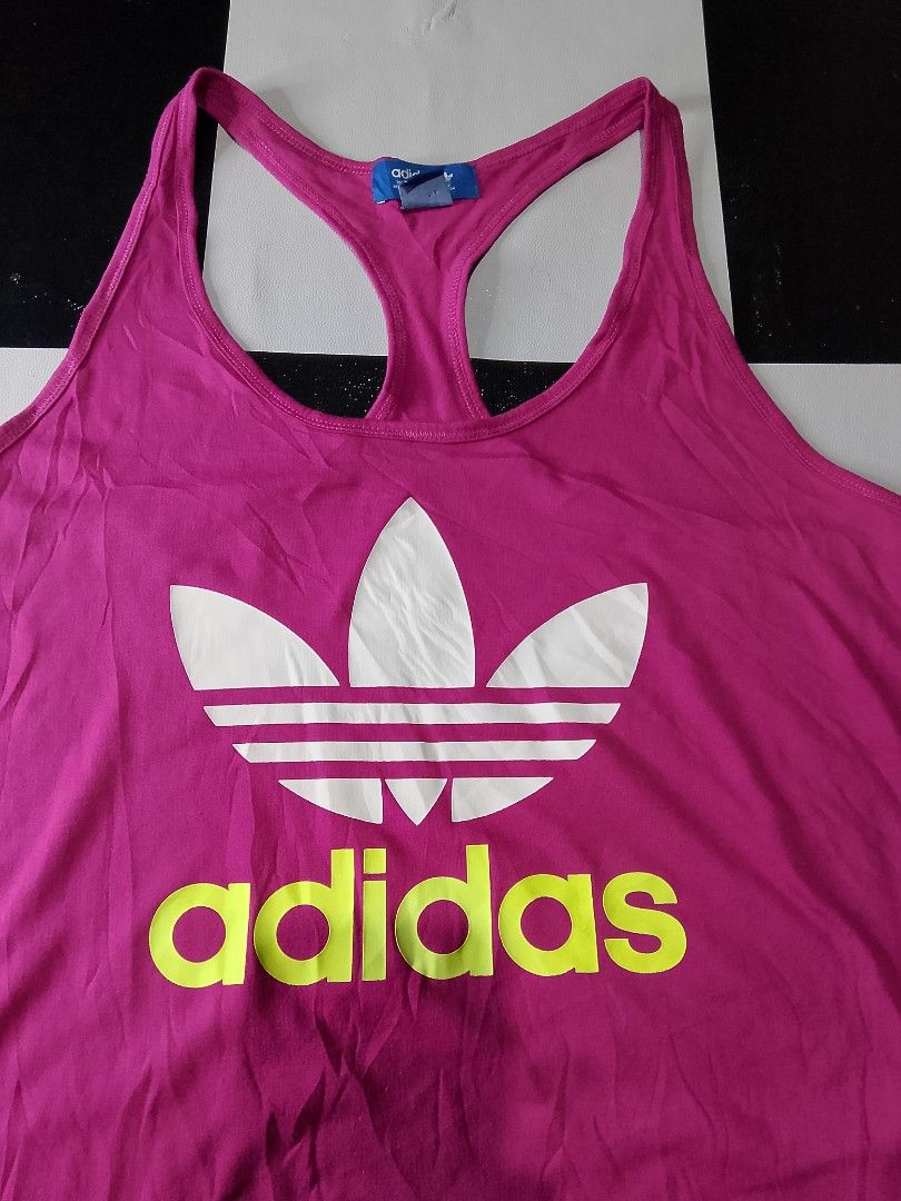 Adidas Racer back Tank Top (Category: Activewear) located in Binan City. Submitted by incnt (Listing ID 1469194763, Image 3). Description: 300 Pesos only add shipping fee Size Medium 17*26 Excellent Condition No issues Need wash only "All brand names, logos, and images are registered trademarks of their respective owners. No affiliation or copyright infringement intended.".