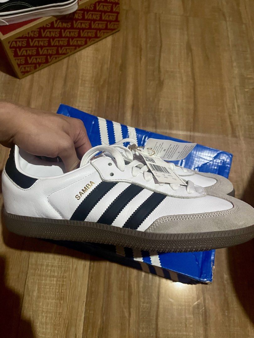 Adidas Samba OG Cloud White Core Black Shoes (Category: Sneakers) located in Baguio. Submitted by nicolesy.co (Listing ID 1469296015, Image 2). Description: negotiable price - Model: Adidas Samba - Colorway: White leather with black stripes and grey suede toe overlays - Sole: Classic gum rubber sole - Condition: Brand new with original tags attached - Packaging: Includes original blue branded box - Size: US 10.5 / UK 10 / FR 44.5 / JP 285 / CHN 2