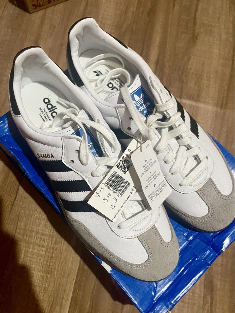 Adidas Samba OG Cloud White Core Black Shoes (Category: Sneakers) located in Baguio. Submitted by nicolesy.co (Listing ID 1469296015, Image 1). Description: negotiable price - Model: Adidas Samba - Colorway: White leather with black stripes and grey suede toe overlays - Sole: Classic gum rubber sole - Condition: Brand new with original tags attached - Packaging: Includes original blue branded box - Size: US 10.5 / UK 10 / FR 44.5 / JP 285 / CHN 2