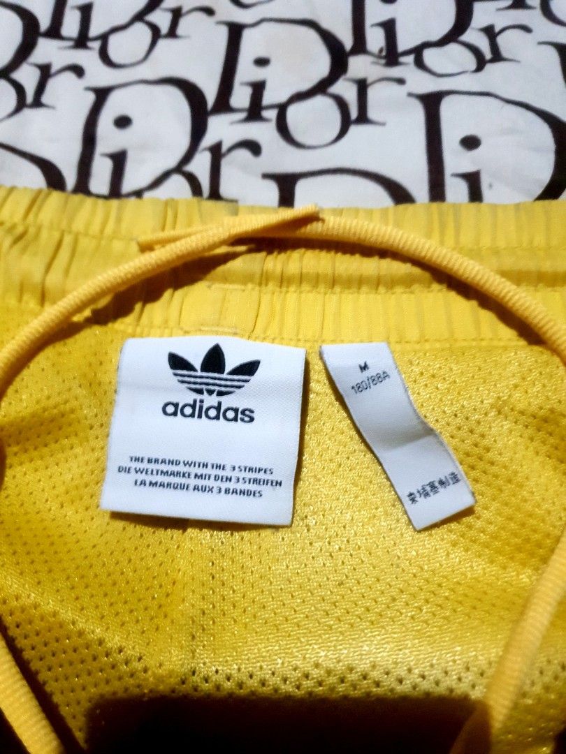 Adidas shorts (Category: Swim Trunks & Board Shorts) located in San Fernando. Submitted by retro.district. (Listing ID 1469375269, Image 2). Description: - Adidas shorts swim shorts - Size: Large Waistline: Freesize w/ Lace Length: 18 thighs:12 Leg opening: 11.