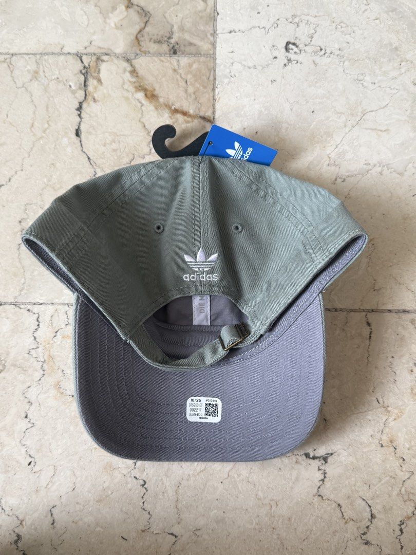 Adidas Trefoil Adjustable Fit Baseball Cap Green (Category: Caps & Hats) located in San Pedro. Submitted by moonllax (Listing ID 1469238583, Image 2). Description: - Brand: Adidas - Color: Green with white embroidered trefoil logo - Condition: Brand new, unused with original tags attached - Fit: Adjustable metal strap closure at the back - Details: Clean stitching, structured panels - Style: Great everyday accessory -legit/authentic🇺🇸🇺🇸🇺🇸.