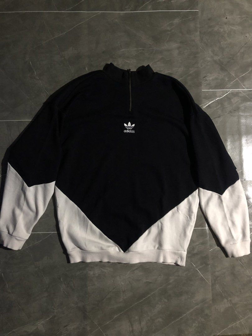 Adidas trefoil turtle neck pull over (Category: Coats, Jackets and Outerwear) located in Manila. Submitted by buksthrifthing (Listing ID 1469217378, Image 2). Description: 23 by 27 Can fit to medium and large No issue 9.5/10 color rate Excellent condi Complete tags.