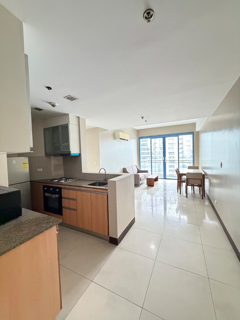 AFFORDABLE & SPACIOUS 2BR IN THREE CENTRAL MAKATI (Category: Apartments & Condos) located in Taguig. Submitted by dacanayglad29 (Listing ID 1469219075, Image 2). Description: ✅ Live in the heart of Makati in this high-floor 2-bedroom residence at Three Central, offering space, convenience, and strong investment value in a prime CBD address. • Location: Three Central, Valero Street, Makati City Enjoy seamless access to Makati's major business dist