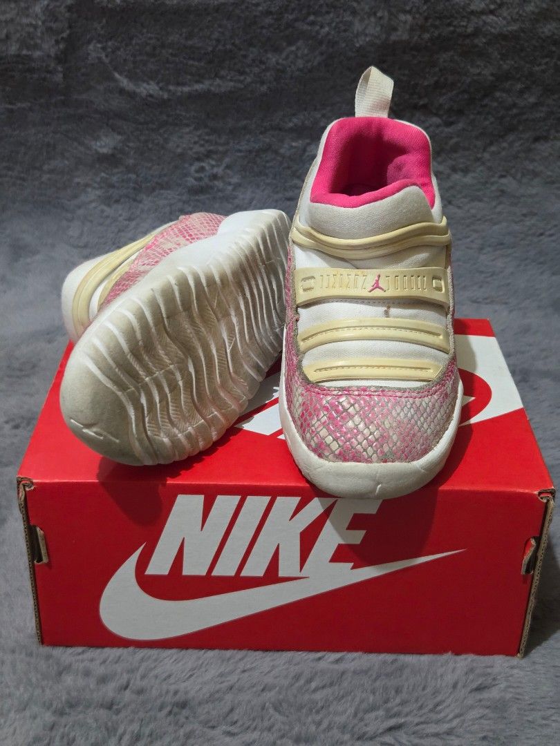 Air Jordan 11 Kids (Category: Babies & Kids Fashion) located in Bulacan. Submitted by gtrvddg (Listing ID 1469246236, Image 2). Description: - Brand: Nike Air Jordan - Size: 9C Toddler - Color/Design: Pink and white snake print.