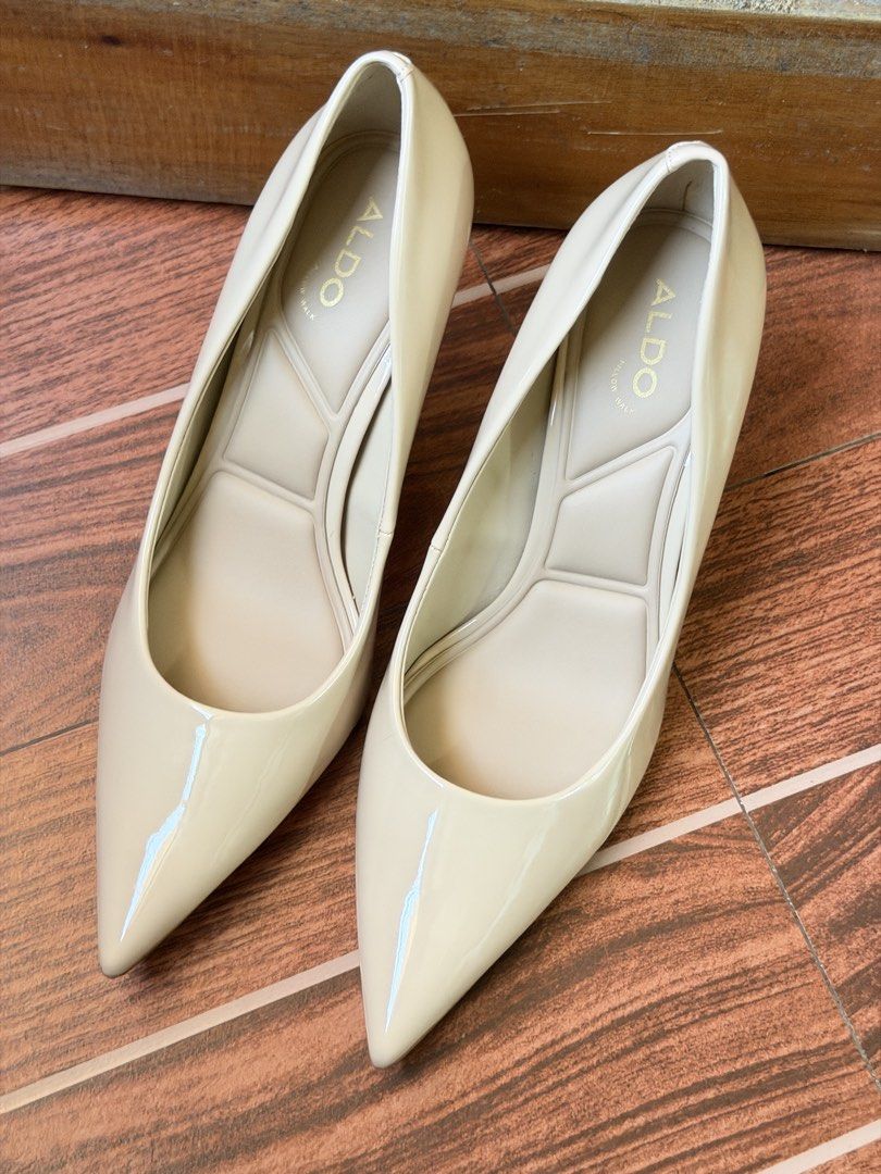 ALDO Kaitie Heels (Category: Heels) located in Cavite. Submitted by peppermintsss (Listing ID 1469384660, Image 3). Description: - Brand: ALDO - Color: Nude - Material: Patent leather with glossy finish - Features: Pointed toe, Pillow Walk tech insoles for extra comfort - Condition: Used once - Best for: Work, formal events, or everyday classic style ‼️ Size details on the box.