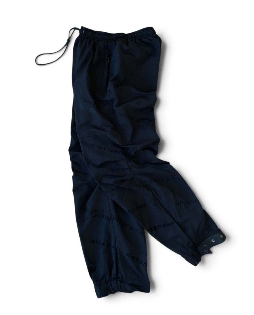 Alexander Wang AOP Track Pants (Category: Joggers) located in Cabanatuan. Submitted by rmgalleria (Listing ID 1469161892, Image 1). Description: Alexander Wang AOP Track Pants Excellent Condition minimal issue only Waistline: 28-34 Length: 38 750📌.