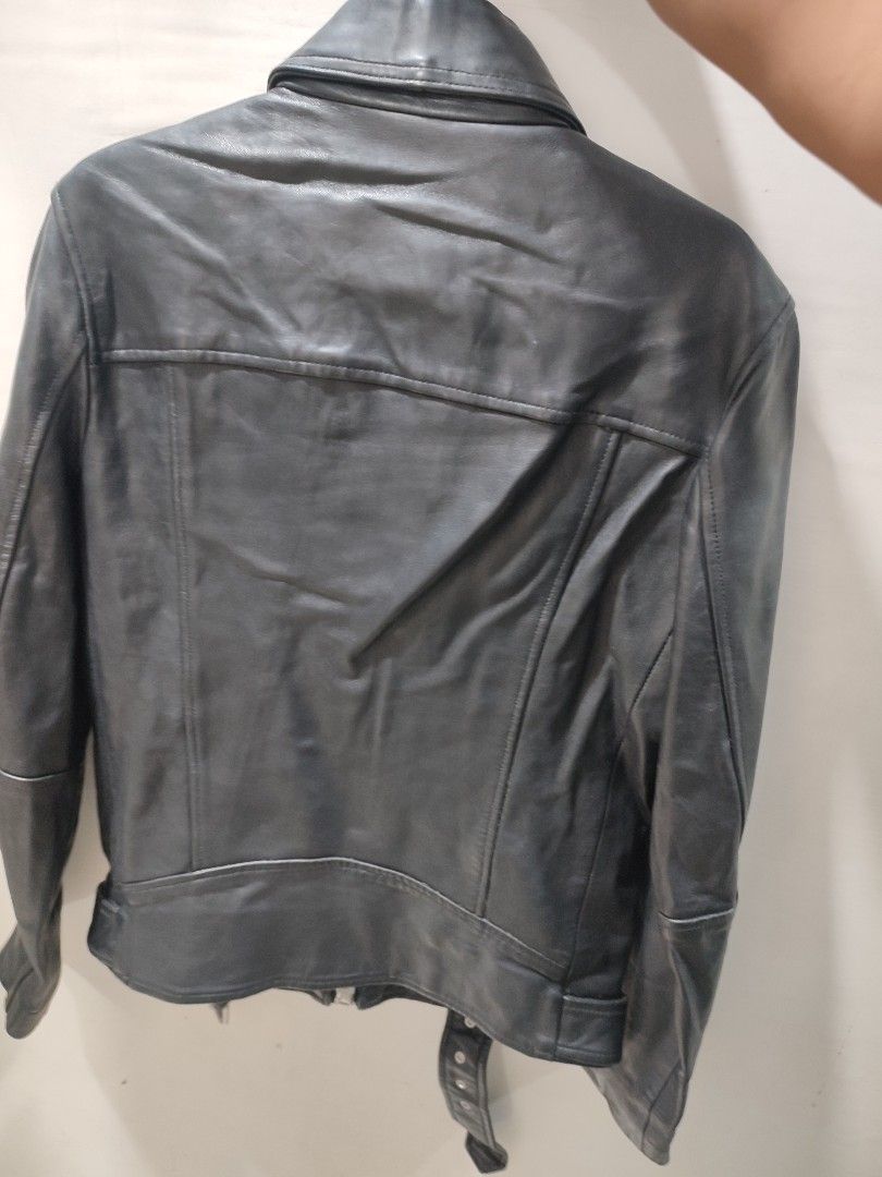 AllSaints Leather Biker Jacket Extra Small (Category: Coats, Jackets and Outerwear) located in Puerto Princesa. Submitted by thriftedsoulsy2k (Listing ID 1469169495, Image 2). Description: - Brand/Model: AllSaints Black Leather Biker Jacket - Size: Extra Small (XS) - Style: Classic moto design with smooth leather finish - Hardware: Silver-tone hardware with asymmetrical zip closure - Details: Shoulder epaulets, multiple zipped pockets, and a buck