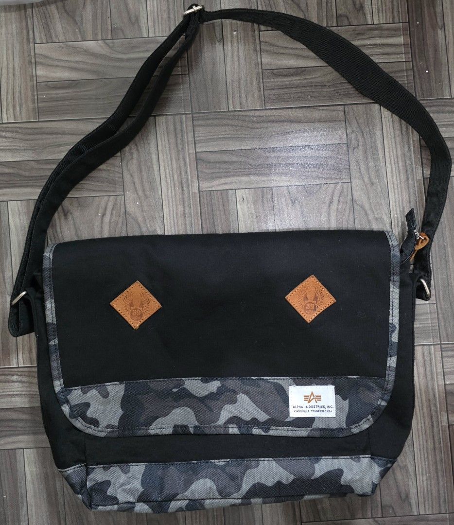 Alpha Industries Camouflage Shoulder Messenger Bag (Category: Sling Bags) located in Quezon City. Submitted by trickstercollect (Listing ID 1469264696, Image 1). Description: Brand: Alpha Industries Condition: Excellent Meet up: Trinoma or LRT 2 Anonas Shipping: LBC - Weekdays J&T - Weekends.