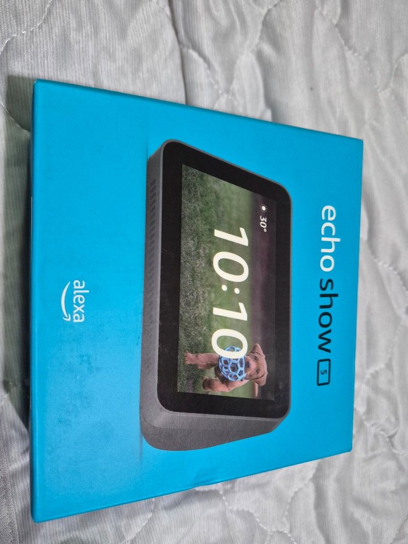Amazon Echo Show 5 (Category: Soundbars, Speakers & Amplifiers) located in Quezon City. Submitted by gamerguy1211 (Listing ID 1469315928, Image 1). Description: - Brand: Amazon - Model: Echo Show 5 - Condition: lightly used in box, with plastic wrapper and 15.0W power adapter included - Features: Smart display with Alexa voice assistant.