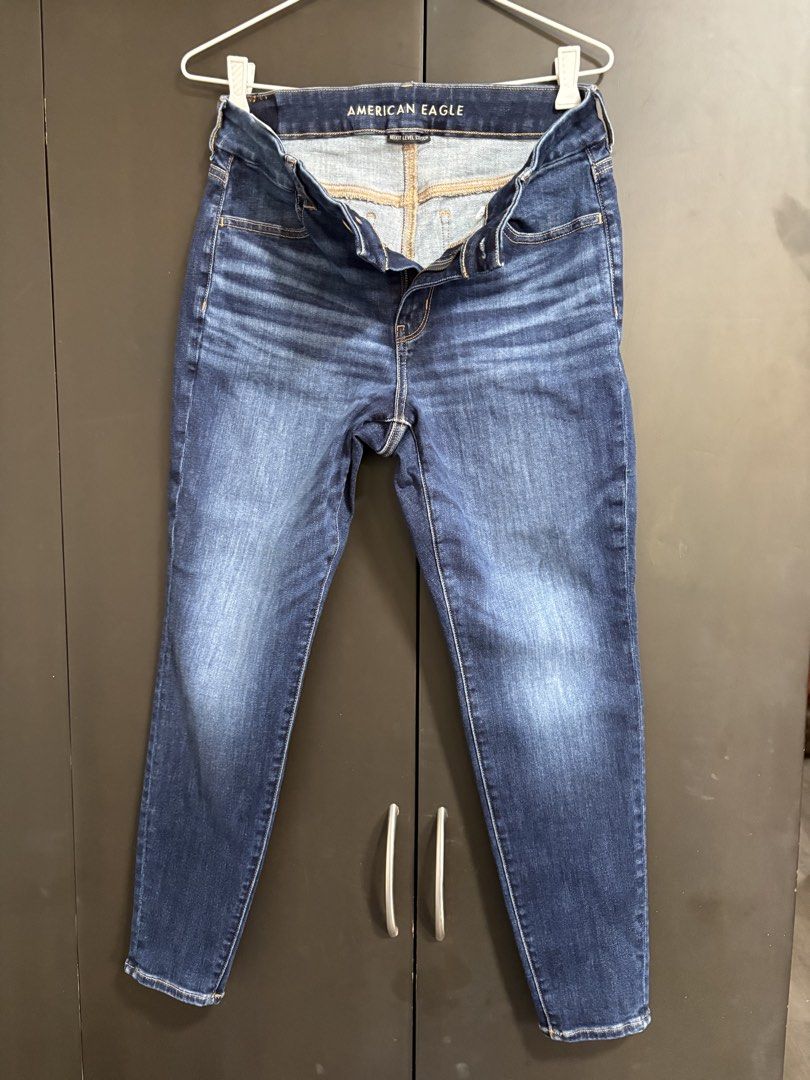 American Eagle Next Level Stretch Blue Skinny Jeans (Category: Jeans) located in Las Pinas. Submitted by beissmart (Listing ID 1469218587, Image 1). Description: - Brand: American Eagle - Color: Dark blue wash with subtle front thigh whiskering - Material: Next Level Stretch fabric for ultimate comfort and flexibility - Fit: Skinny fit leg style - Details: Standard five-pocket setup, signature back pocket stitching, leather back waistband patch, 