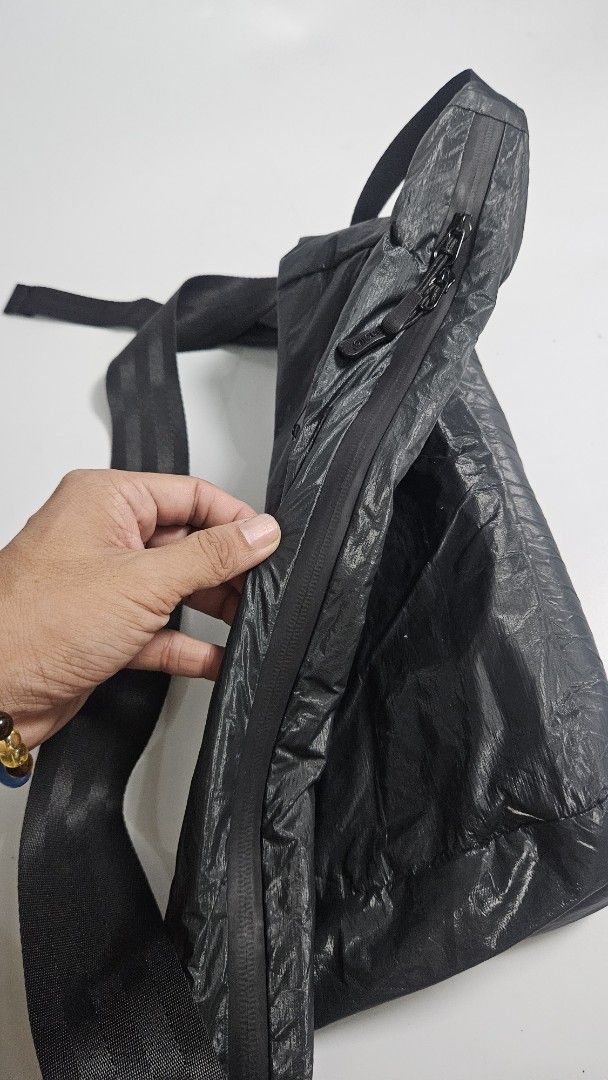 anello All Weather Shoulder Bag Medium Black (Category: Sling Bags) located in Alfonso. Submitted by jbcamet (Listing ID 1469272785, Image 3). Description: - Authentic anello medium shoulder bag designed by Carrot Co. in Japan - Made from durable, stylish black crinkled nylon material - Equipped with waterproof zippers to keep your essentials safe on rainy days - Spacious main compartment featuring convenient inner pockets - Adjustable wide shoul