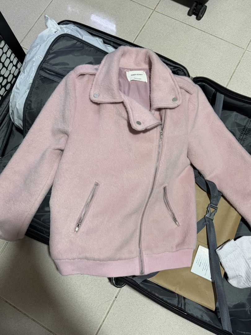 Anna Verry Pink Fuzzy Biker Jacket (Category: Coats, Jackets and Outerwear) located in Quezon City. Submitted by wonderrv18 (Listing ID 1469185008, Image 1). Description: - Brand: Anna Verry - Style: Fuzzy pink biker jacket with trendy diagonal zipper - Warmth: Ribbed hem and cuffs to lock in heat - Pockets: Two functional front zippered pockets - Material: Soft wool-blend with a fully lined interior - Perfect for: Winter and cool weather pastel 