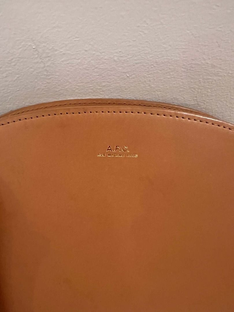 A.P.C. Demi-Lune (Half Moon) Bag (Category: Luxury Bags & Wallets) located in Caloocan City. Submitted by janielata45386 (Listing ID 1469215446, Image 3). Description: A.P.C. Demi-Lune (Half-Moon) bag in classic camel leather. Timeless, minimalist design with an adjustable shoulder strap. Comes with original A.P.C. dust bag. Good as new, used only 3 times. 👜 Brand/Model: A.P.C. Demi-Lune 🤎 Color: Camel / Tan ✨ Material: Leather 💰 Selling Price
