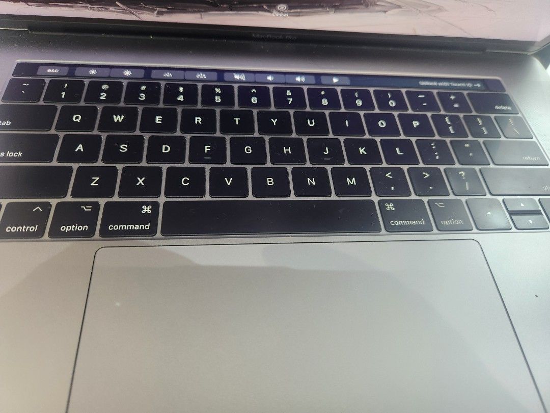 Apple MacBook Pro Space Grey (Category: Laptops & Notebooks) located in Manila. Submitted by dj3002 (Listing ID 1469167210, Image 2). Description: - Model: MacBook Pro in Space Grey - Features: Touch Bar and clear working display - Condition: Clean silver body, well-maintained - Keyboard: Standard English layout with smooth trackpad - Reason for selling: Upgraded to a new device - Inclusion: Laptop only (ready for use).