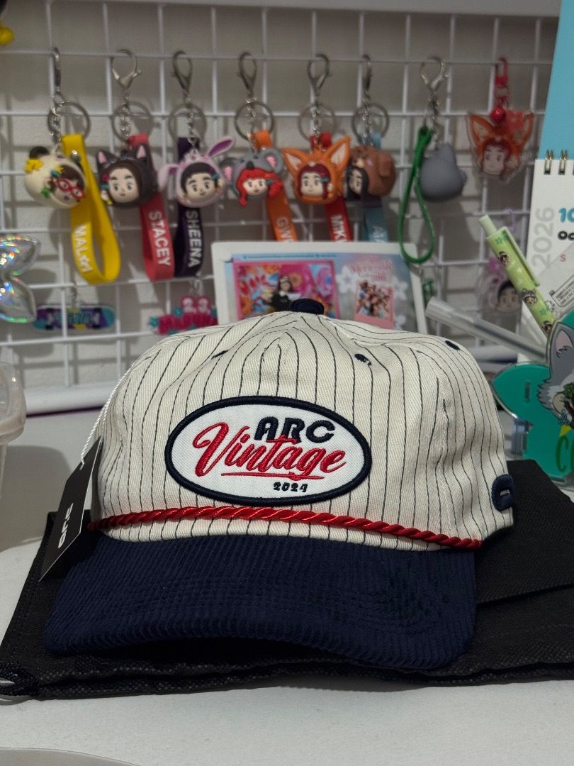 ARC Vintage Cap (Category: Caps & Hats) located in Mabalacat. Submitted by xandramaglaqui (Listing ID 1469339880, Image 1). Description: - Brand: ARC Vintage 2026 - Condition: Brand new, unworn, with tag still attached - Inclusion: Comes with a black fabric dust pouch.