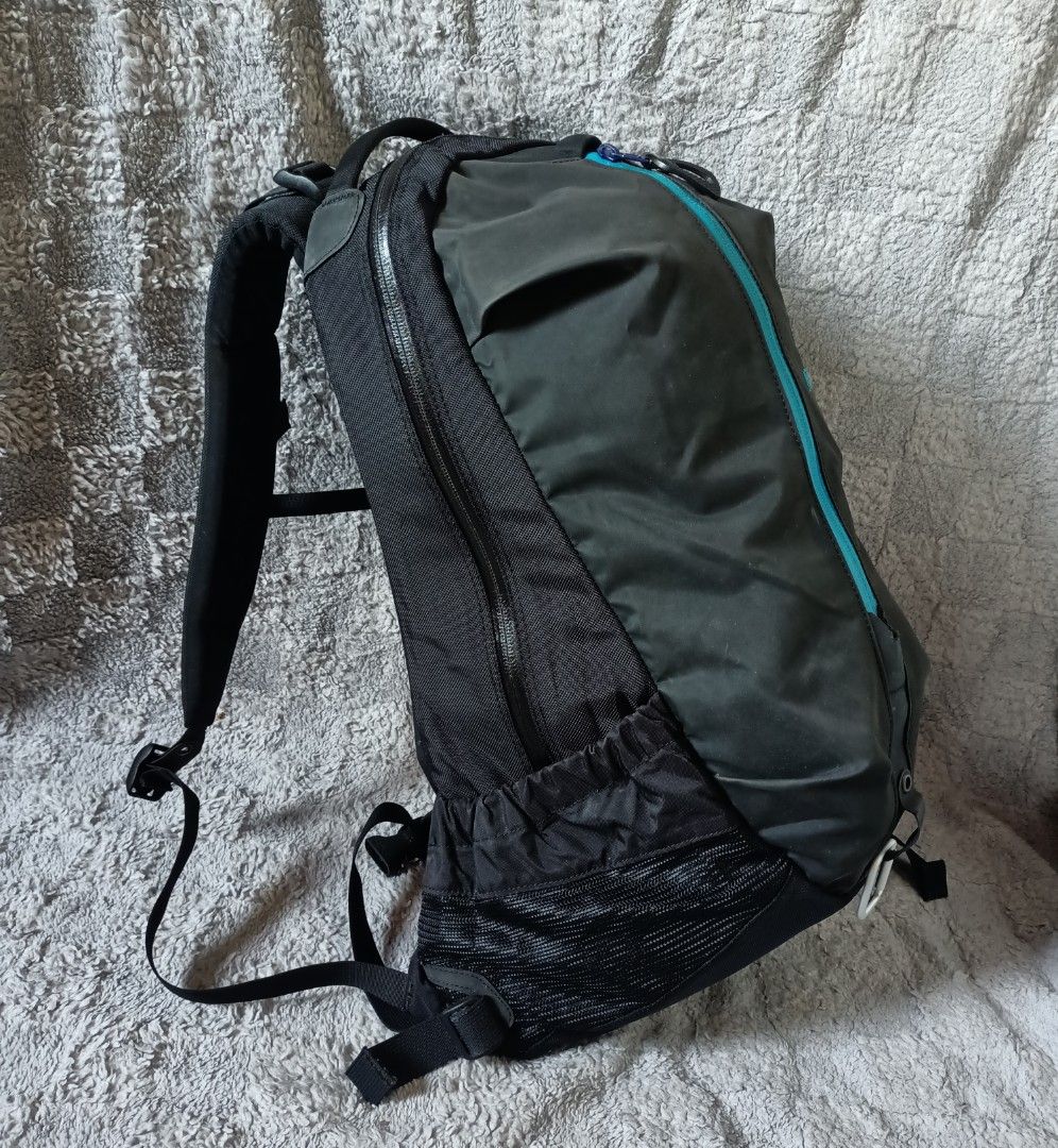 Arcteryx arro 22 backpack (Category: Backpacks) located in Asingan. Submitted by arnelpalaris8 (Listing ID 1469285140, Image 3). Description: Arcteryx Arro 22 Backpack Verygood condition PM ME • Capacity: 22 liters • Design: Distinctive vertical waterproof front pocket with a molded back panel • Branding: Iconic Arc'teryx fossil logo and text embroidered on the side • Usage: Popular for urban commuting, light day hikes, and gorpcore fashion..