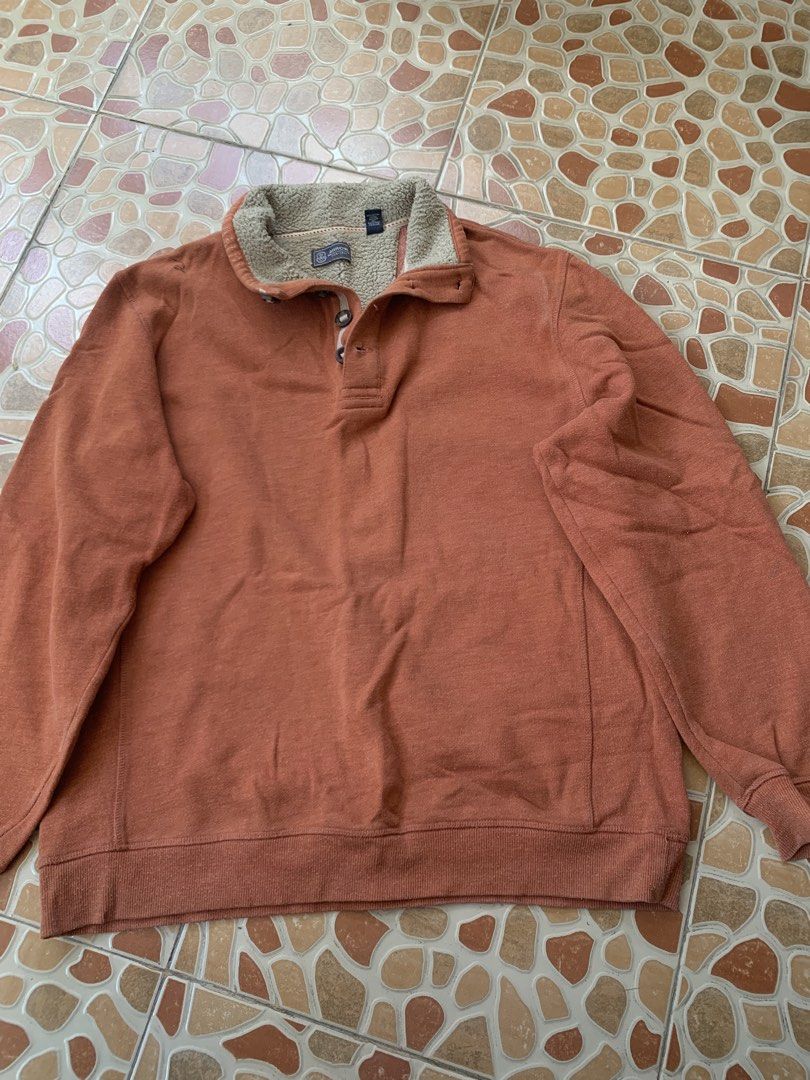 Arrow USA 1851 Sherpa Collar Pullover Sweater Orange (Category: Coats, Jackets and Outerwear) located in Lipa City. Submitted by thriftshopp042 (Listing ID 1469201094, Image 1). Description: - Brand: Arrow USA 1851 - Color: Terracotta orange - Material: Soft and cozy cotton blend - Lining: Warm sherpa-lined inner collar - Design: Three-button placket neckline with dark buttons - Details: Ribbed cuffs and hemline for a snug fit - Style: Great casu