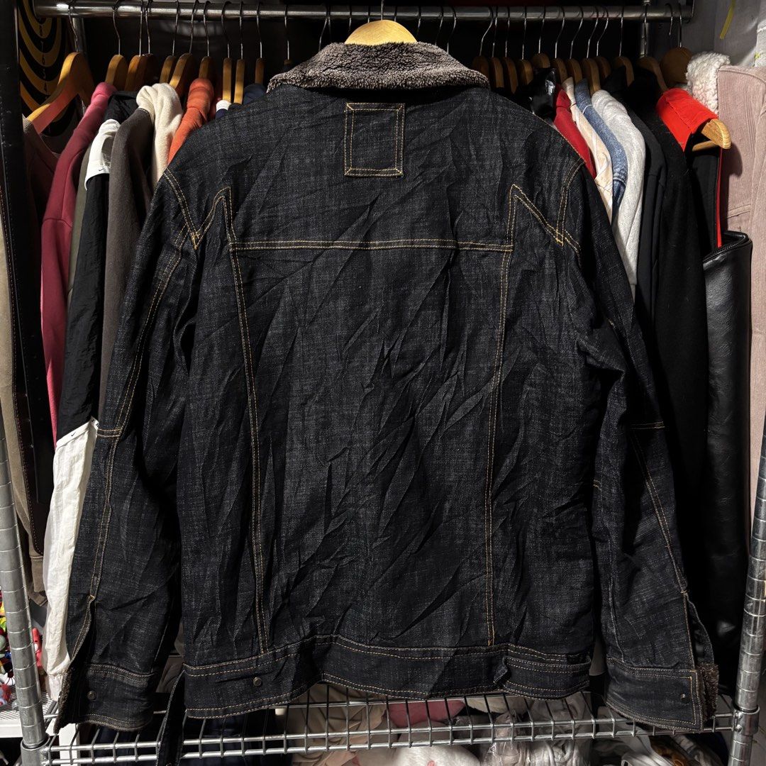 Artist Study Sherpa Denim Jacket (Category: Coats, Jackets and Outerwear) located in Caloocan City. Submitted by bonsatocha43876 (Listing ID 1469321900, Image 3). Description: - Brand: Artist Study - Style: Dark denim jacket with warm sherpa collar and lining - Closure: Full zip front - Pockets: Dual chest pockets and lower side pockets - Measurements: Width 23 inches, Length 28 inches.