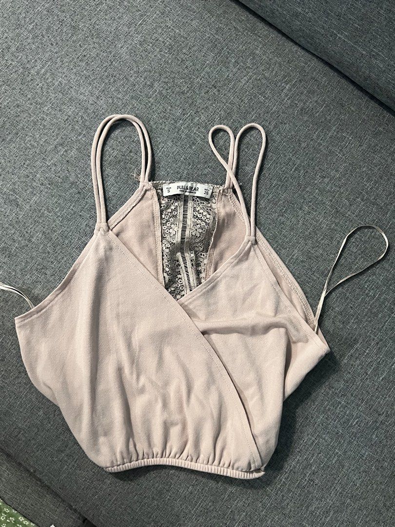 ASOS DESIGN tube top (Category: Sleeveless) located in Angeles City. Submitted by camieday24 (Listing ID 1469355886, Image 2). Description: 80 EACH ASOS DESIGN tube top in brown. Simple strapless style, easy to match with anything. Tag inside shows ASOS branding. Clean fabric, comfortable fit. Great basic for layering or warm days..