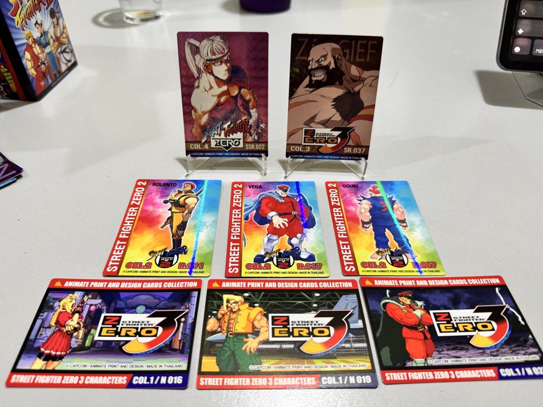 Assorted characters (Category: Raw Singles) located in Mandaluyong City. Submitted by mikes_collectibles (Listing ID 1469222181, Image 2). Description: Selling Street Fighter Zero cards as set: SSR Young Sagat SR Zangief R Rolento R Vega (M. Bison) R Gouki (Akuma) N Karin N Nash N Vega (M. Bison).