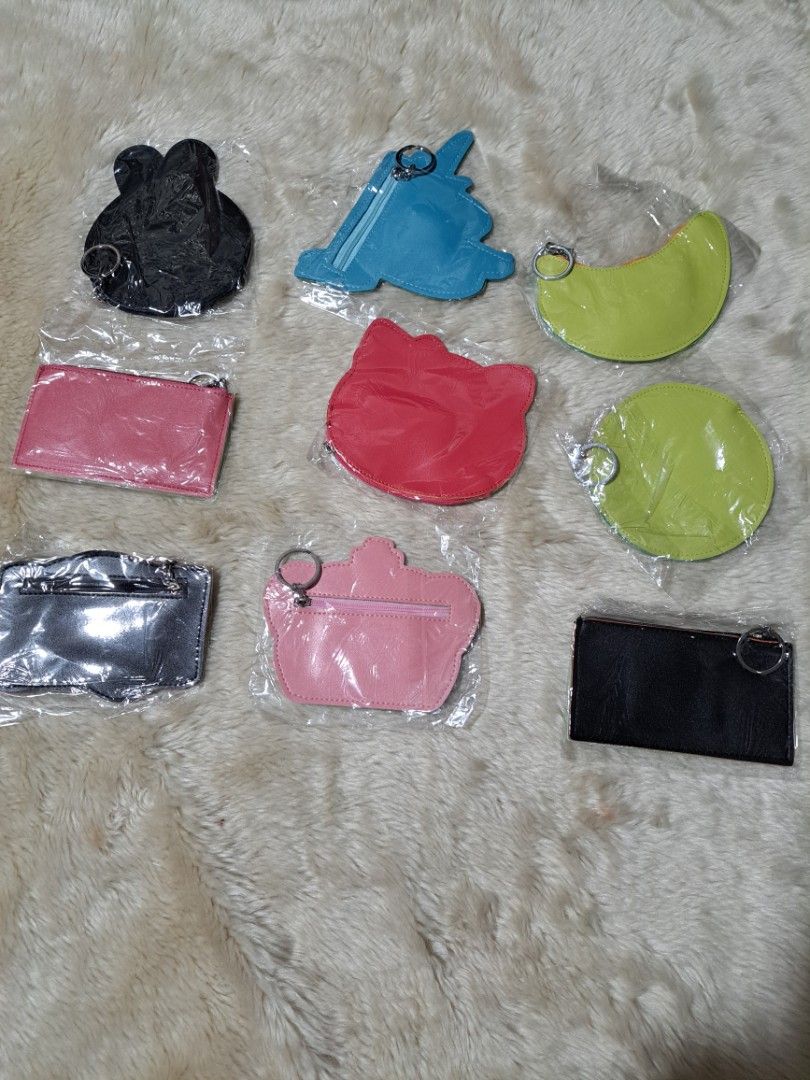 Assorted Cute Character Coin Pouches Keychains (Category: Purses & Pouches) located in Quezon City. Submitted by sbvdmanaog (Listing ID 1469204039, Image 2). Description: SALE 3pcs for 100 - Cute and trendy designs: Unicorn, Kitty, banana, emojis, crown, and camera - Multi-purpose: Ideal for keeping keys, loose change, or small trinkets organized - Convenient: Every pouch comes with a handy attachment ring - Clean and ready: Each piece is individ
