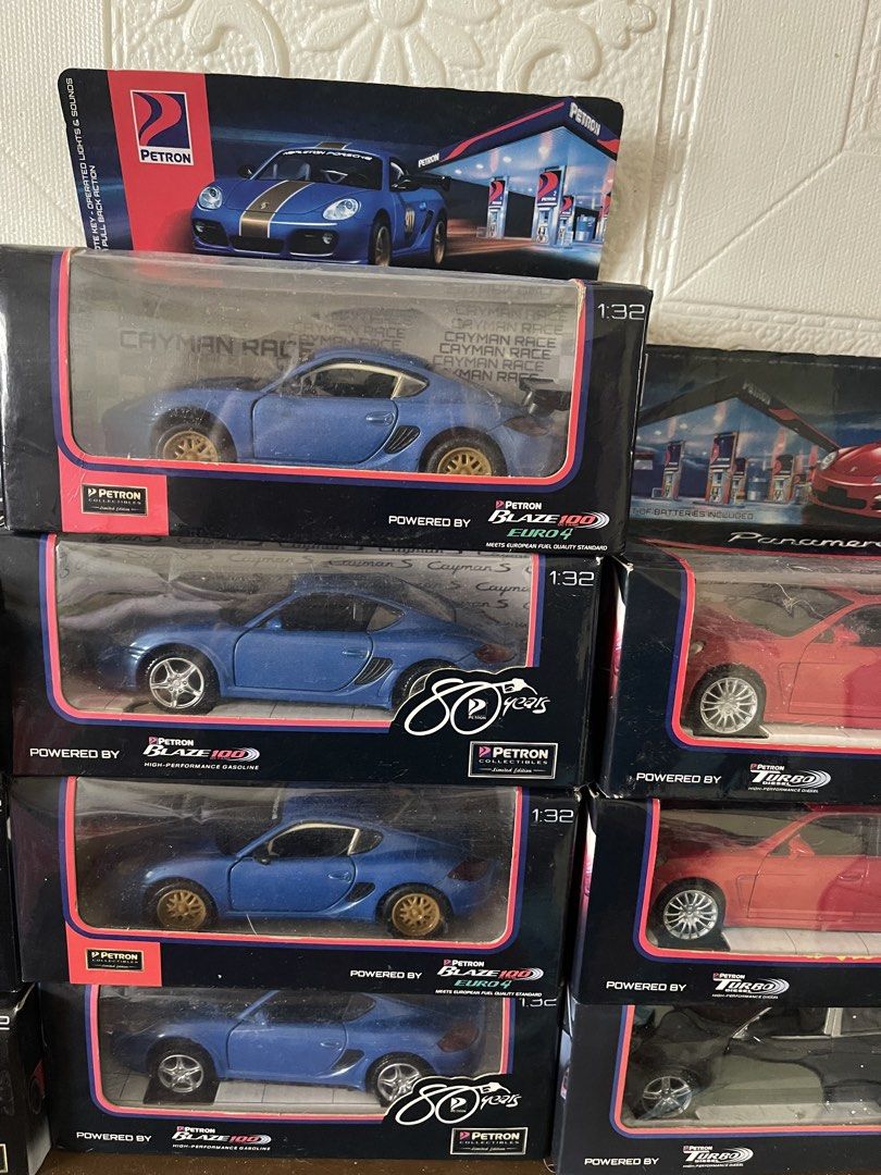 Assorted Petron and Shell V-Power Diecast Scale Model Cars (Category: Vehicle & Diecast Models) located in Quezon City. Submitted by paulg0113 (Listing ID 1469305190, Image 3). Description: - Brands: Porsche, Ferrari, Lamborghini, Pagani, Ford - Special Editions: Petron Blaze 100, Shell V-Power, and 80th Year Limited Edition packaging - Scales: Mostly 1:32 and 1:38 - Colors Available: Blue, red, black, silver, white, and yellow - Condition: Store
