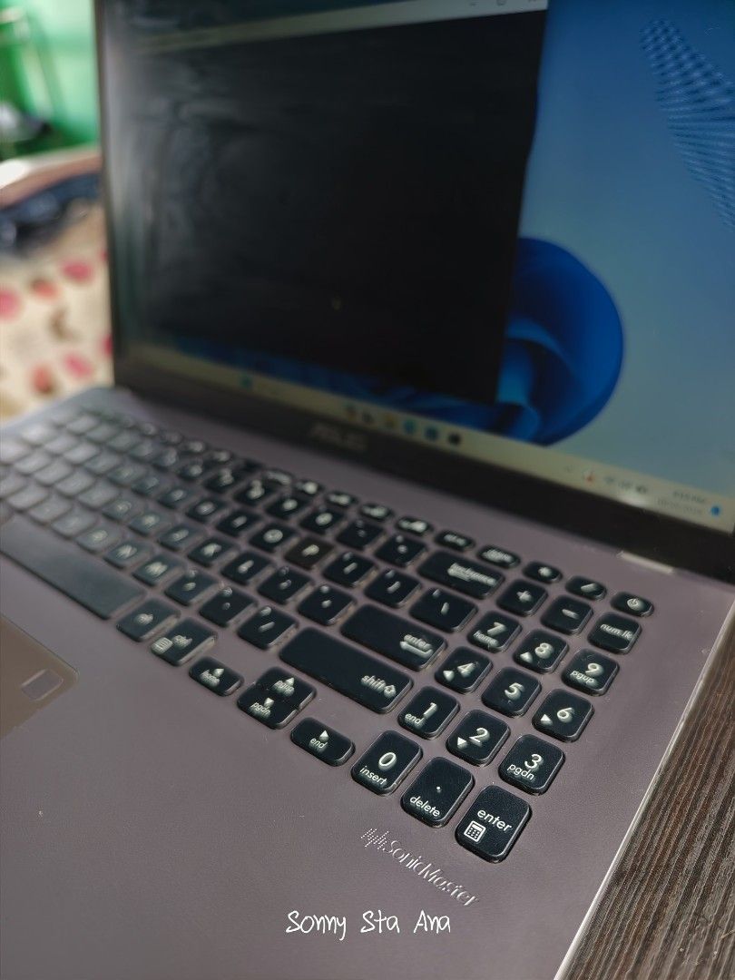 ASUS Laptop Windows 11 Pro (Category: Laptops & Notebooks) located in Quezon City. Submitted by gadgetsun (Listing ID 1469222722, Image 3). Description: - Brand: ASUS laptop in a sleek grey finish - OS: Windows 11 Pro, fully set up and ready to use - Keyboard: Full-size layout complete with a side number pad - Display & Build: Clean screen with a durable, solid build - Connectivity: Convenient side ports including USB - Note: Features a Technos s