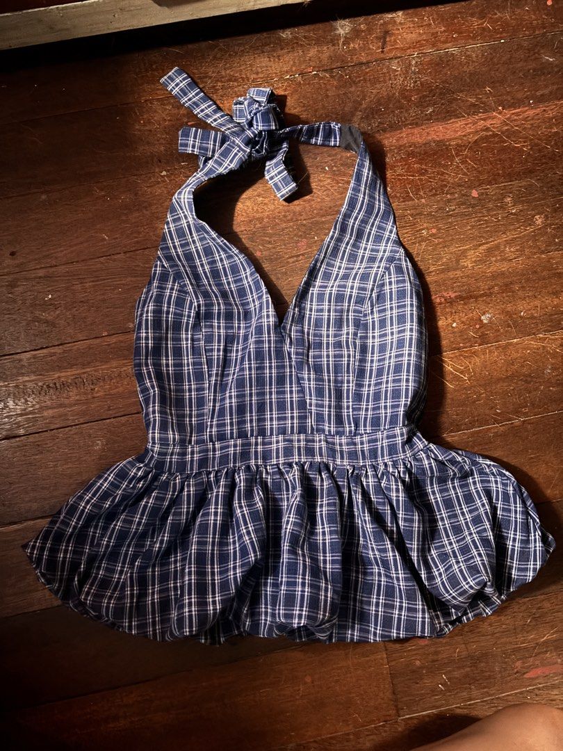 Aurora Blue Plaid Halter Top (Category: Sleeveless) located in Marikina City. Submitted by arteleur (Listing ID 1469187980, Image 1). Description: Bought this for 500pesos -never worn - Brand: Aurora - Style: Blue plaid halter top with V-neck and self-tie neck strap - Fit: Fitted bodice with a trendy flared bubble hem - Styling tip: Pairs perfectly with white shorts or a casual skirt Rfs: too showy.