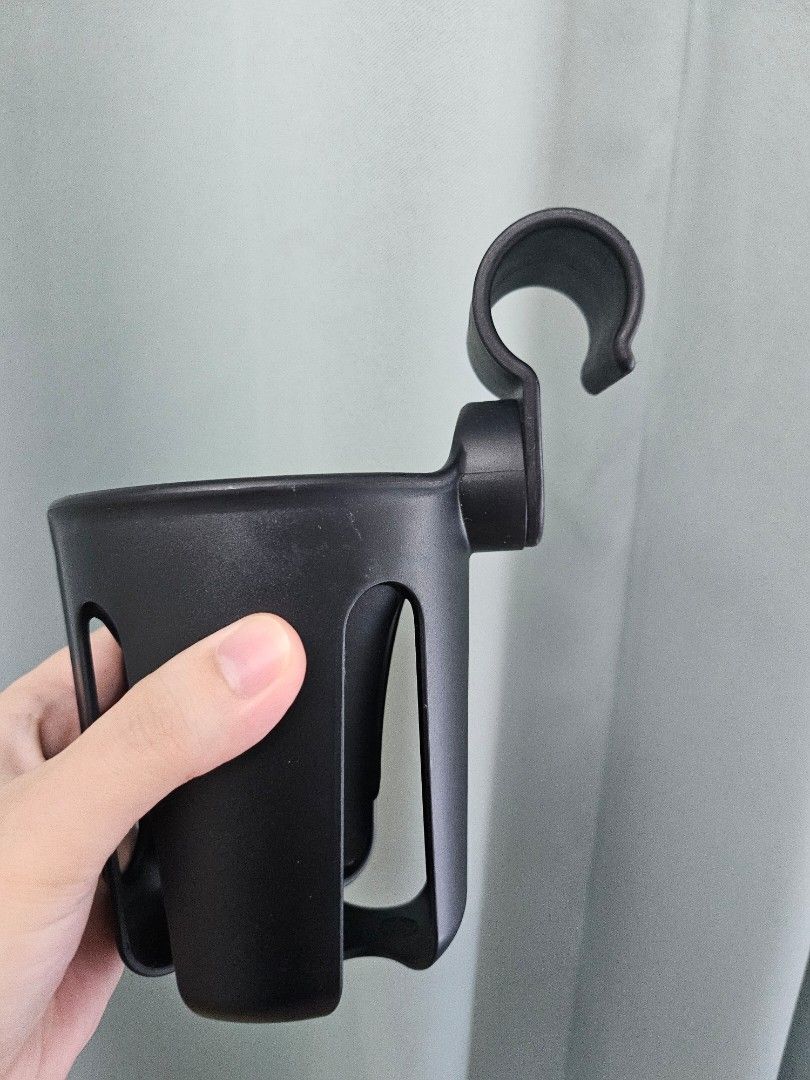 Authentic Babyzen YOYO Stroller Cup Holder (Category: Strollers) located in Manila. Submitted by ashleypark2019 (Listing ID 1469236166, Image 2). Description: ​Official Babyzen YOYO Stroller Cup Holder in clean and great condition! ​Essential accessory for your daily walks. Keeps your coffee, tumbler, or baby bottle secure and within reach while pushing the stroller. ​Details: ​Authentic Babyzen YOYO (Features the official 'Y' logo on the clip) ​