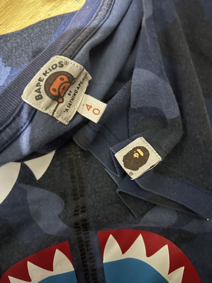 AUTHENTIC BAPE KIDS SHARK SHIRT (Category: Babies & Kids Fashion) located in Manila. Submitted by dplug (Listing ID 1469333646, Image 3). Description: Authentic/Legit/Original Size 140 Good Condition With 1 pinhole (see pic) -North Caloocan .