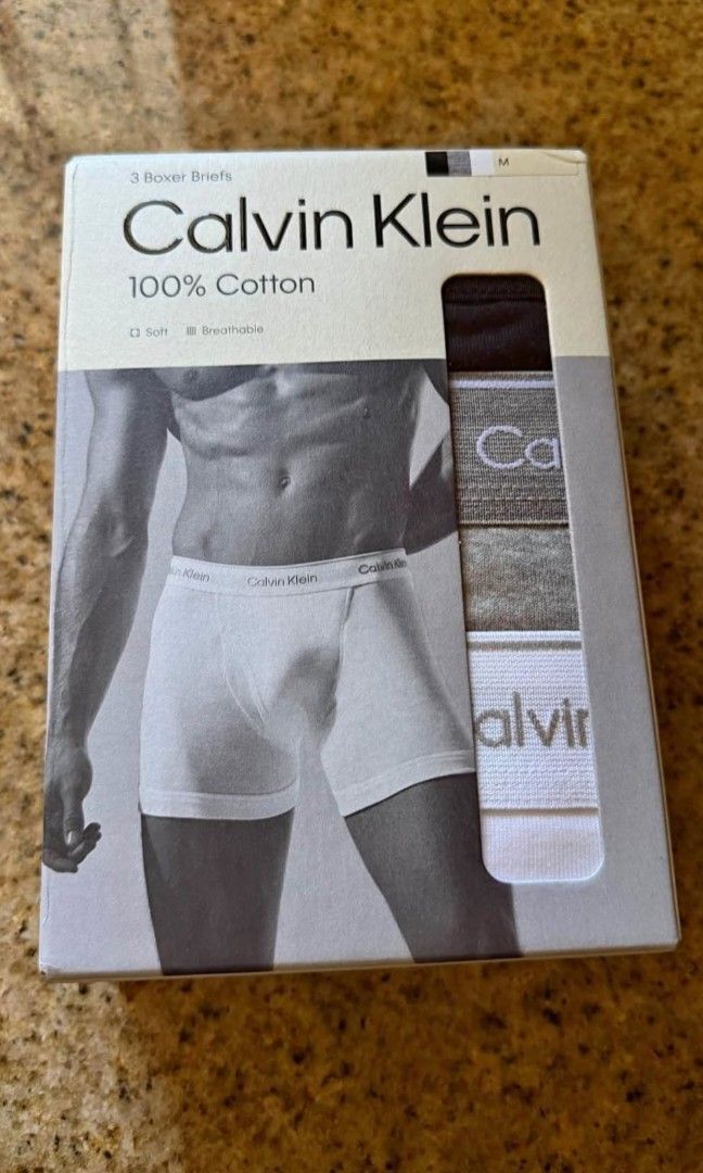 Authentic Calvin Klein Boxer Brief 3 Pack (NEW) (Category: Underwear) located in San Juan. Submitted by docpratty (Listing ID 1469356152, Image 1). Description: Brand New (Sealed) Packs of Boxer Briefs Colors: Black, Gray, and White Size: Medium 2 packs available 999 each pack or 1,800 for both packs.