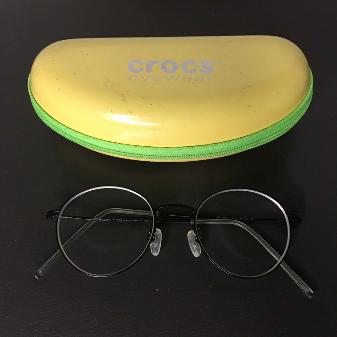 Authentic Crocs Eyewear Round Wire Eyeglass Frame (With Hard Case) (Category: Sunglasses & Eyewear) located in Makati City. Submitted by tasteofluxury (Listing ID 1469236702, Image 1). Description: Authentic Crocs Eyewear Round Wire Eyeglass Frame (With Hard Case) Up for sale is an authentic Crocs Eyewear round optical frame made in Korea. Features a slim, minimalist black wire metal frame with a retro round design and subtle Crocs branding on th