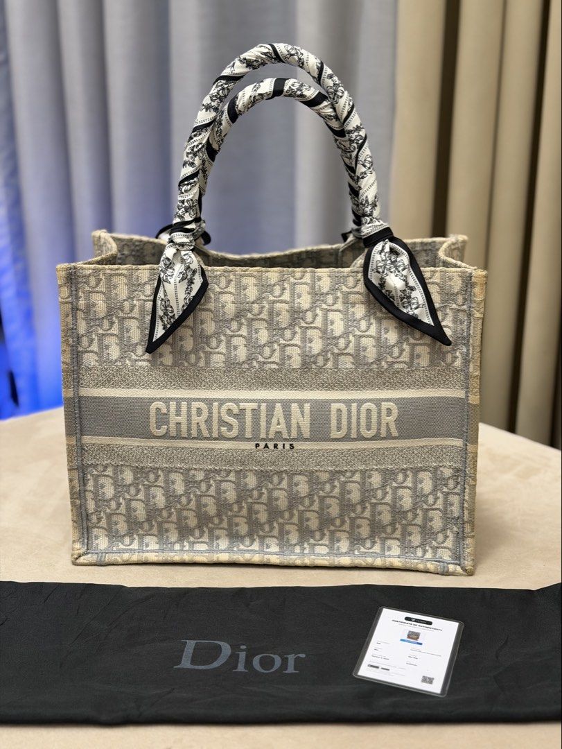 Authentic Dior Oblique Medium Booktote (Category: Tote Bags) located in Manila. Submitted by maria_2326 (Listing ID 1469351511, Image 1). Description: 💯% Authentic w/ dust bag, COA, free twilly Location: Manila/QC.