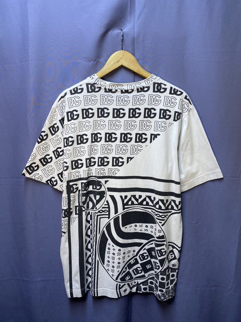 Authentic Dolce & Gabbana “Bandana Graphic” (Category: Tshirts & Polo Shirts ) located in Makati City. Submitted by drip.poww (Listing ID 1469320015, Image 2). Description: - Authentic Dolce & Gabbana - Color: White - Size: Large - Dimes: 23x30 - Authentic - Excellent condition - Need wash, fresh from bale - Material: 100% Cotton Please don’t expect too much—these are thrifted (ukay) items. 😊 !!STILL NEGOTIABLE!!.