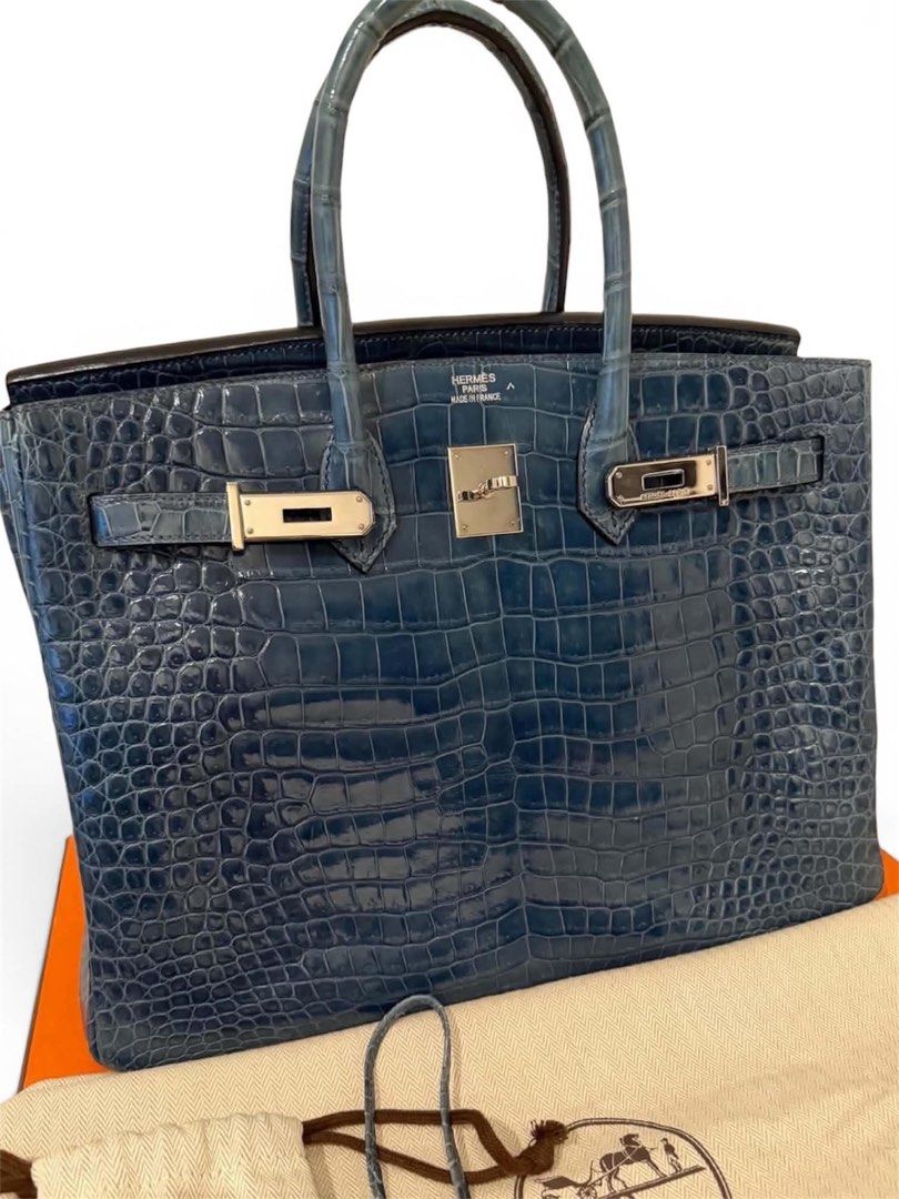 Authentic Hermes (Category: Luxury Bags & Wallets) located in Manila. Submitted by chloe_luxuries (Listing ID 1469292739, Image 2). Description: Guaranteed Original Hermes Birkin 35 Croc Palladium hardware stamp K squared Still in very good condition Comes with dustbag clochette and box Pm for those interested .