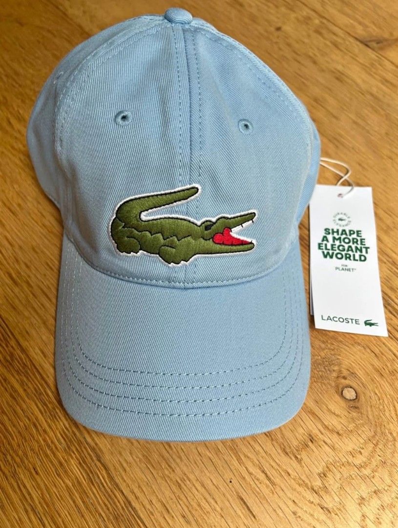 Authentic Lacoste Hat – Light Blue with Large Crocodile Logo (Category: Caps & Hats) located in San Juan. Submitted by docpratty (Listing ID 1469343834, Image 1). Description: Authentic Brand New.