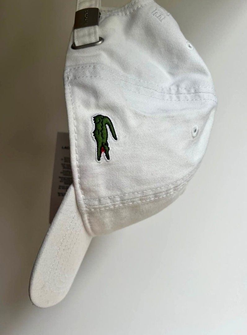 Authentic Lacoste Hat- White- Side Croc Logo (Category: Caps & Hats) located in San Juan. Submitted by docpratty (Listing ID 1469342526, Image 1). Description: Authentic Brand New.