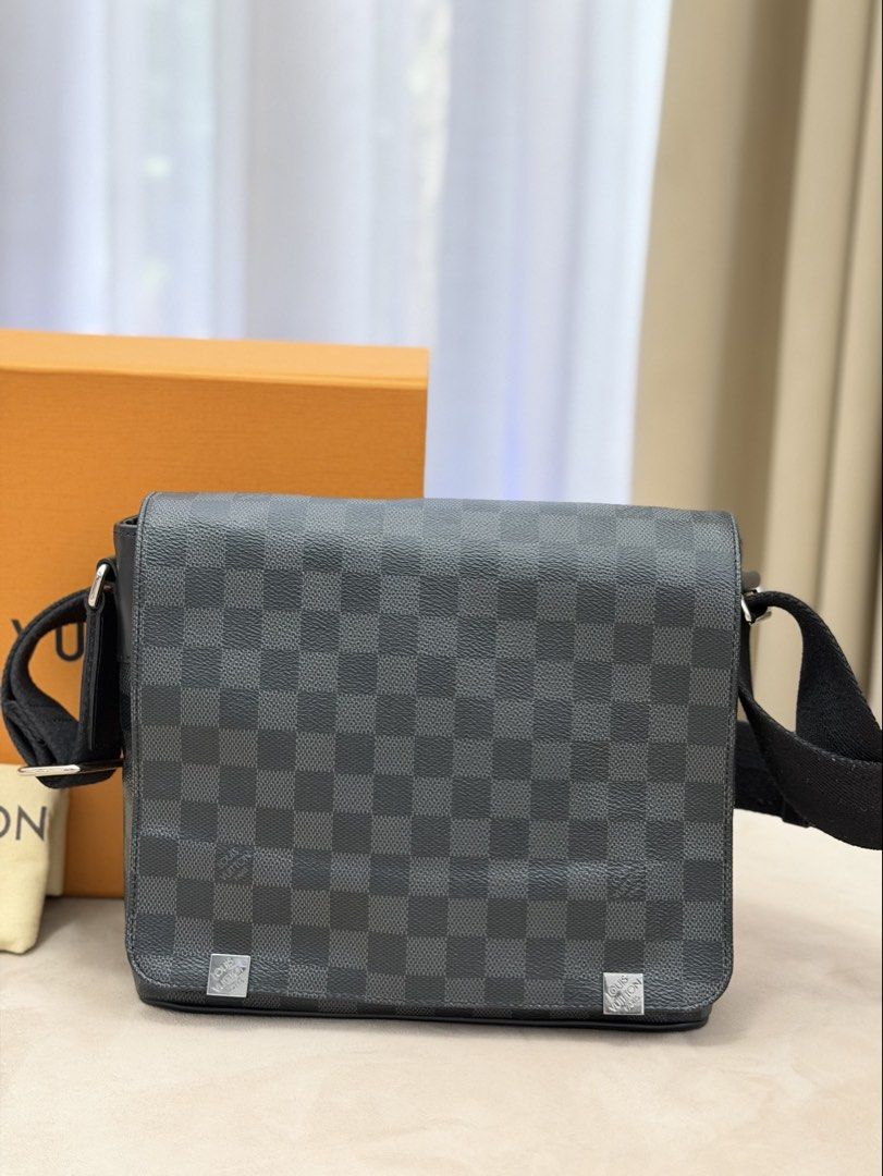 Authentic Louis Vuitton Graphite PM Messenger Bag (Category: Sling Bags) located in Manila. Submitted by maria_2326 (Listing ID 1469352350, Image 2). Description: 💯% Authentic w/box, dust bag, COA Location: Manila/QC.