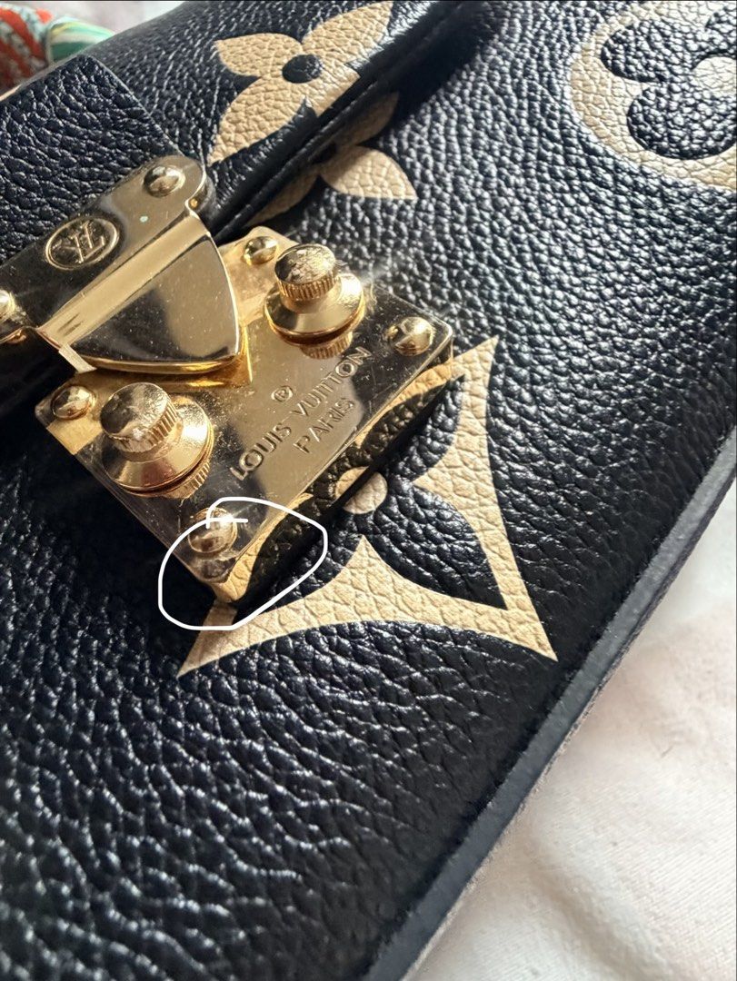 Authentic LV Madeleine (Category: Announcements) located in Bacolod City. Submitted by blackwidow28 (Listing ID 1469221277, Image 3). Description: Authentic Louis Vuitton Madeleine 🖤✨ Pre-loved condition with minor tarnishing on the hardware and hairline scratches on the lock from normal use. Aside from these, no other flaws noted. Please see the photos for the actual condition. ❤️ Microchipped Priced accordingly. Serious buyers only..