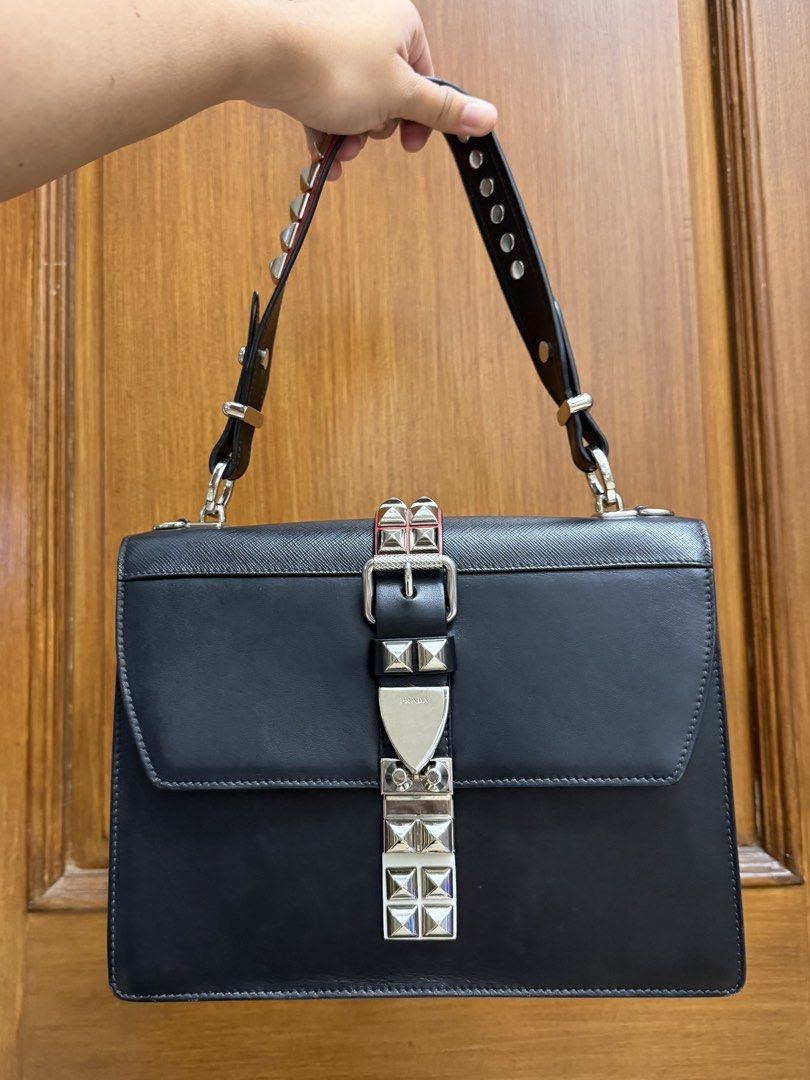 Authentic Prada Elektra Studded Shoulder Bag (Category: Shoulder Bags) located in Manila. Submitted by maria_2326 (Listing ID 1469353036, Image 2). Description: 💯% Authentic w/dust bag, booklet, prada authentication card, entrupy/COA Location: Manila/QC .